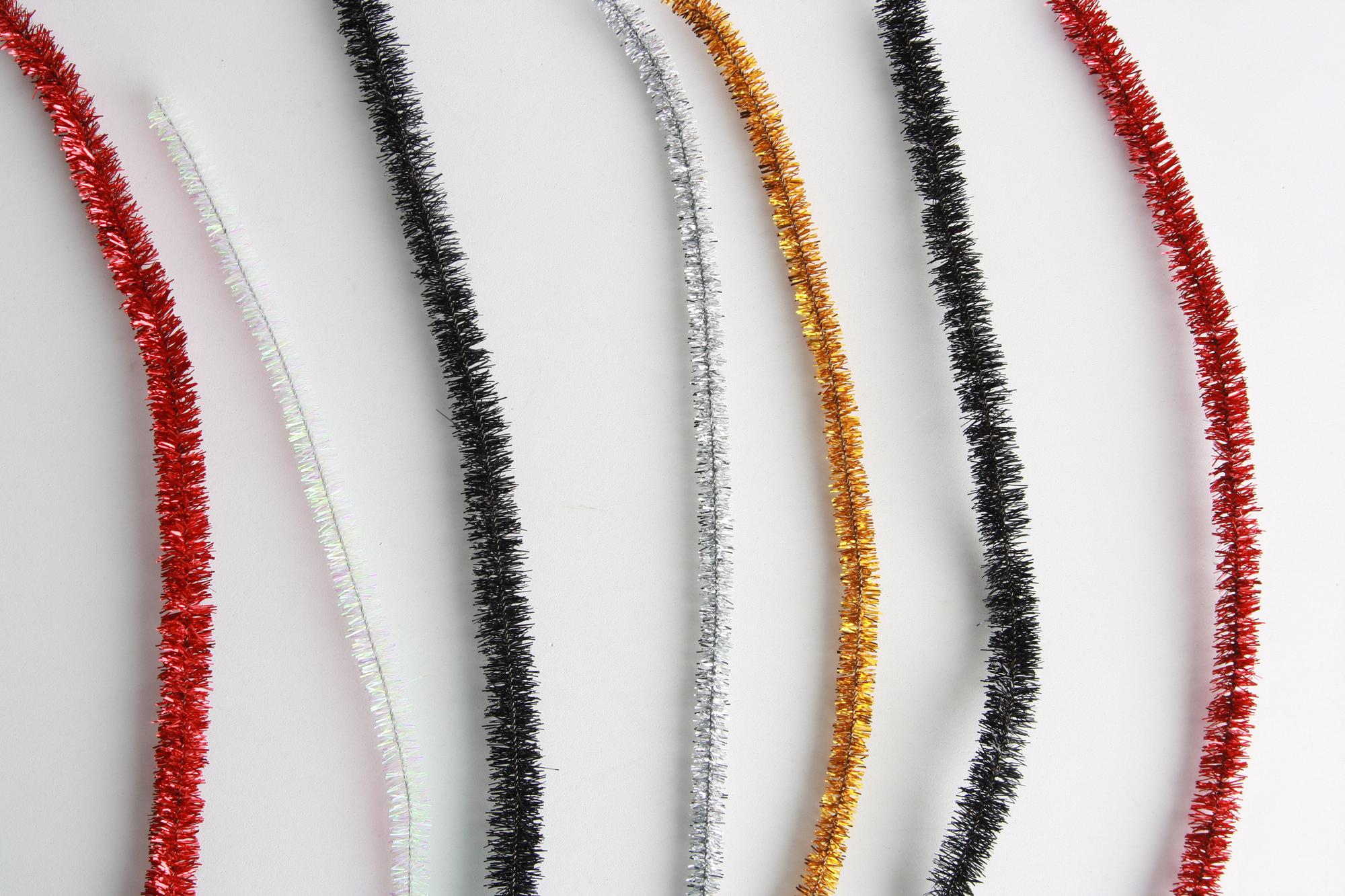 modern embroidery detail on fabric with metallic threads